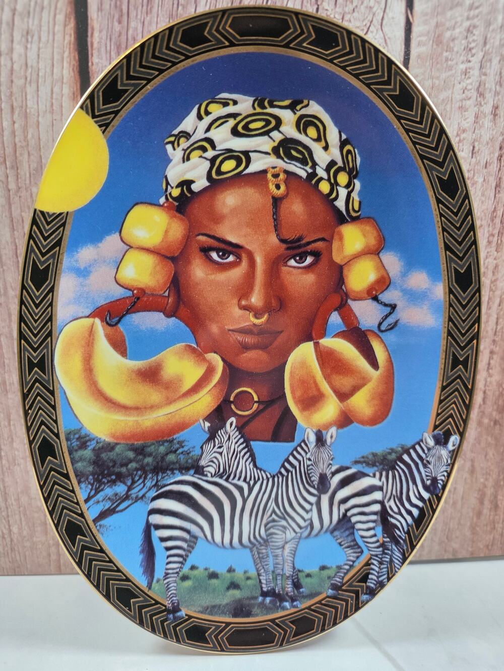ISLANDIA Peul Woman and Zebra